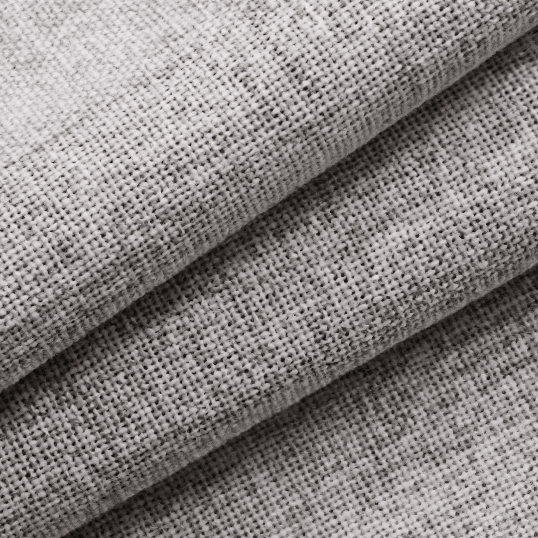 Gros plan sur la matière d’un rideau gris